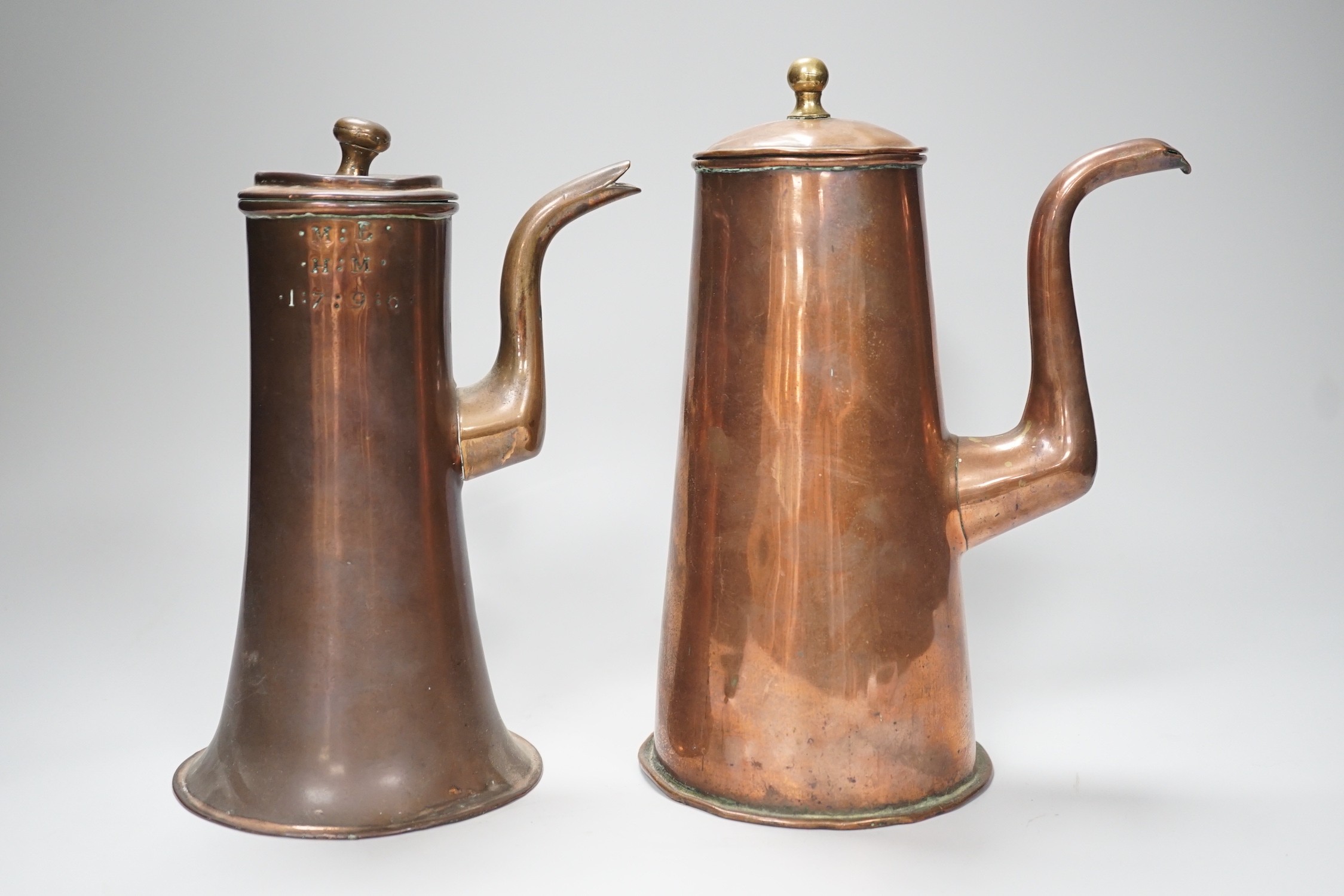 Two 18th century copper tavern coffee pots. Tallest 22.5cm